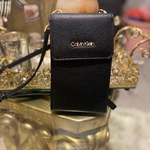 Calvin Klein This versatile crossbody, and worn three different ways.